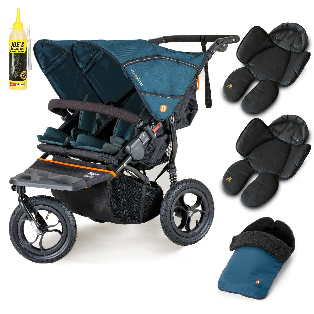 Out N About double nipper in highland blue with 1 footmuffs and 2 newborn inserts.