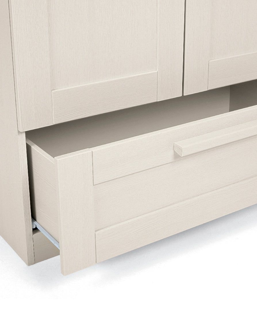 2 door wardrobe with a drawer and hanging rails in stone colour.
