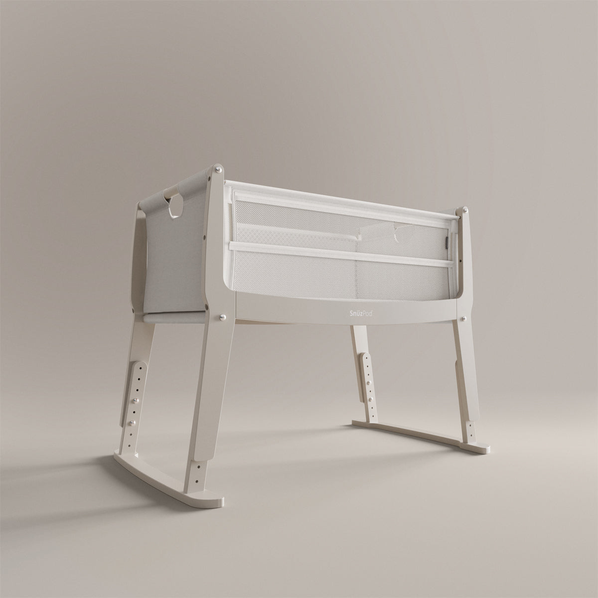 SnuzPod Studio bedside crib in Oslo Light Grey colour.