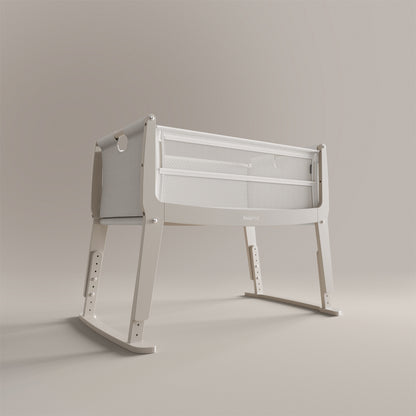 SnuzPod Studio bedside crib in Oslo Light Grey colour.