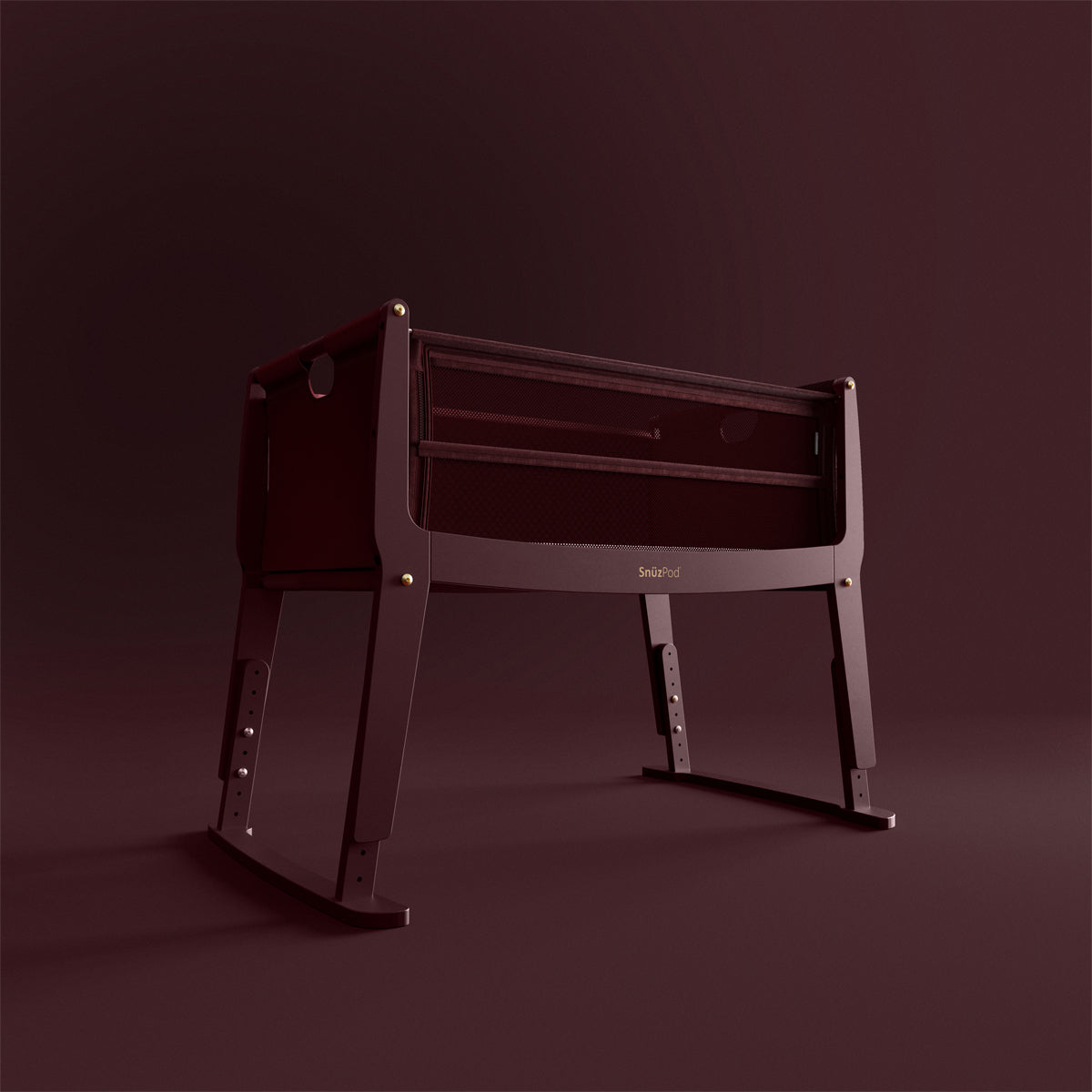 SnuzPod Studio bedside crib in Rome Burgundy colour.