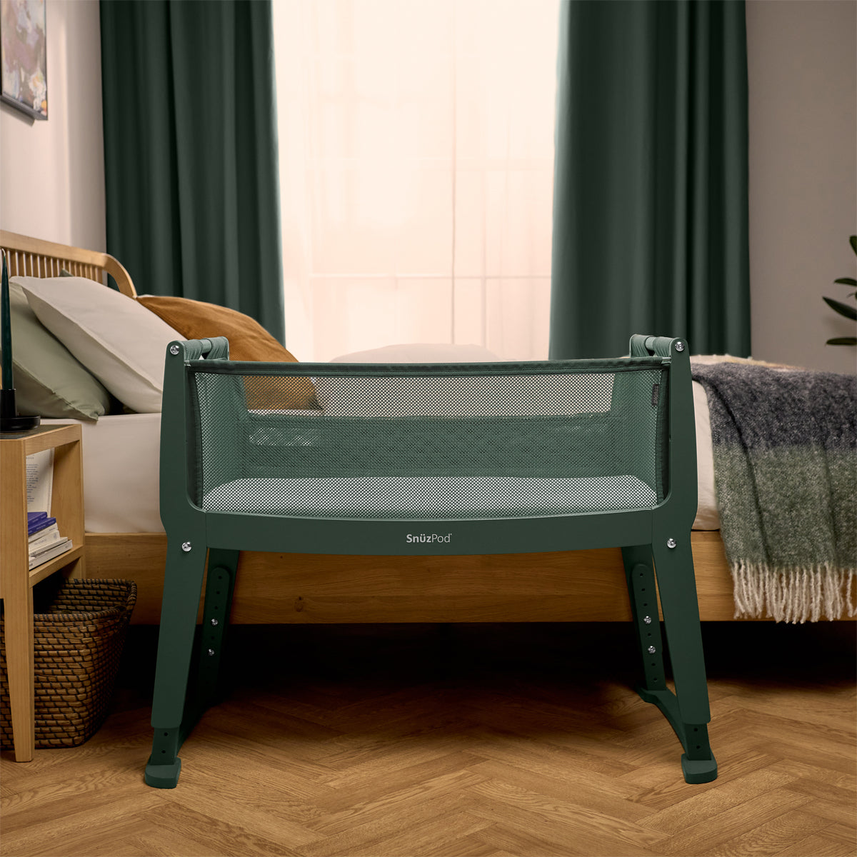 SnuzPod Studio bedside crib in Berlin Green colour.
