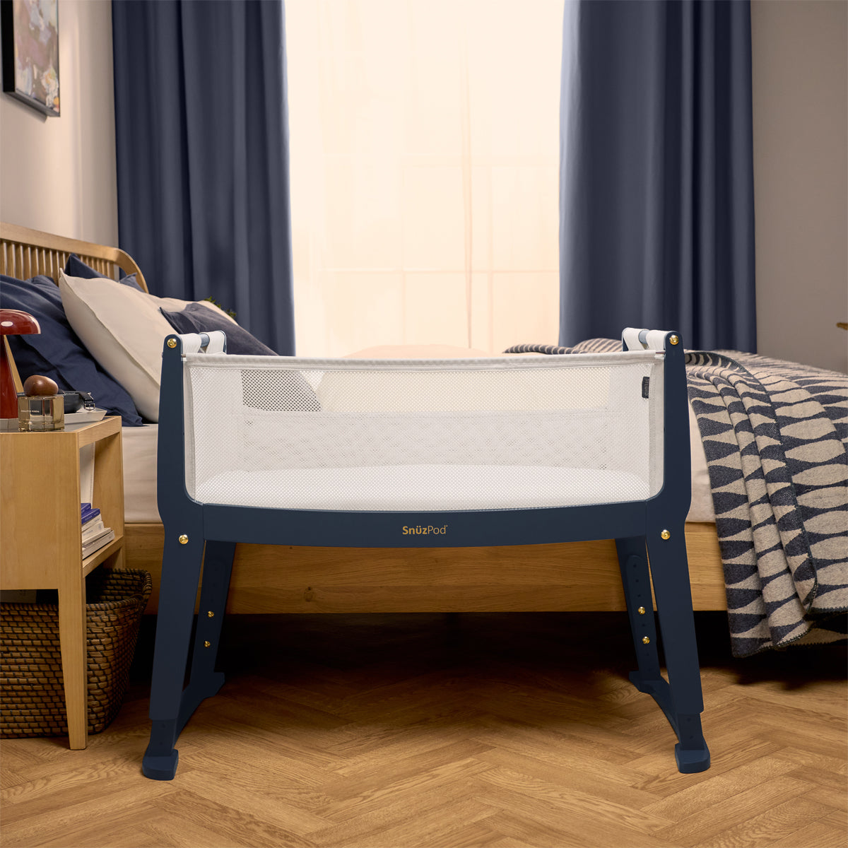 SnuzPod Studio bedside crib in London Navy colour.