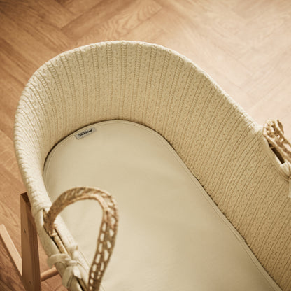 Little green sheep organic mattress protector for moses basket of pram, in a natural beige colour.