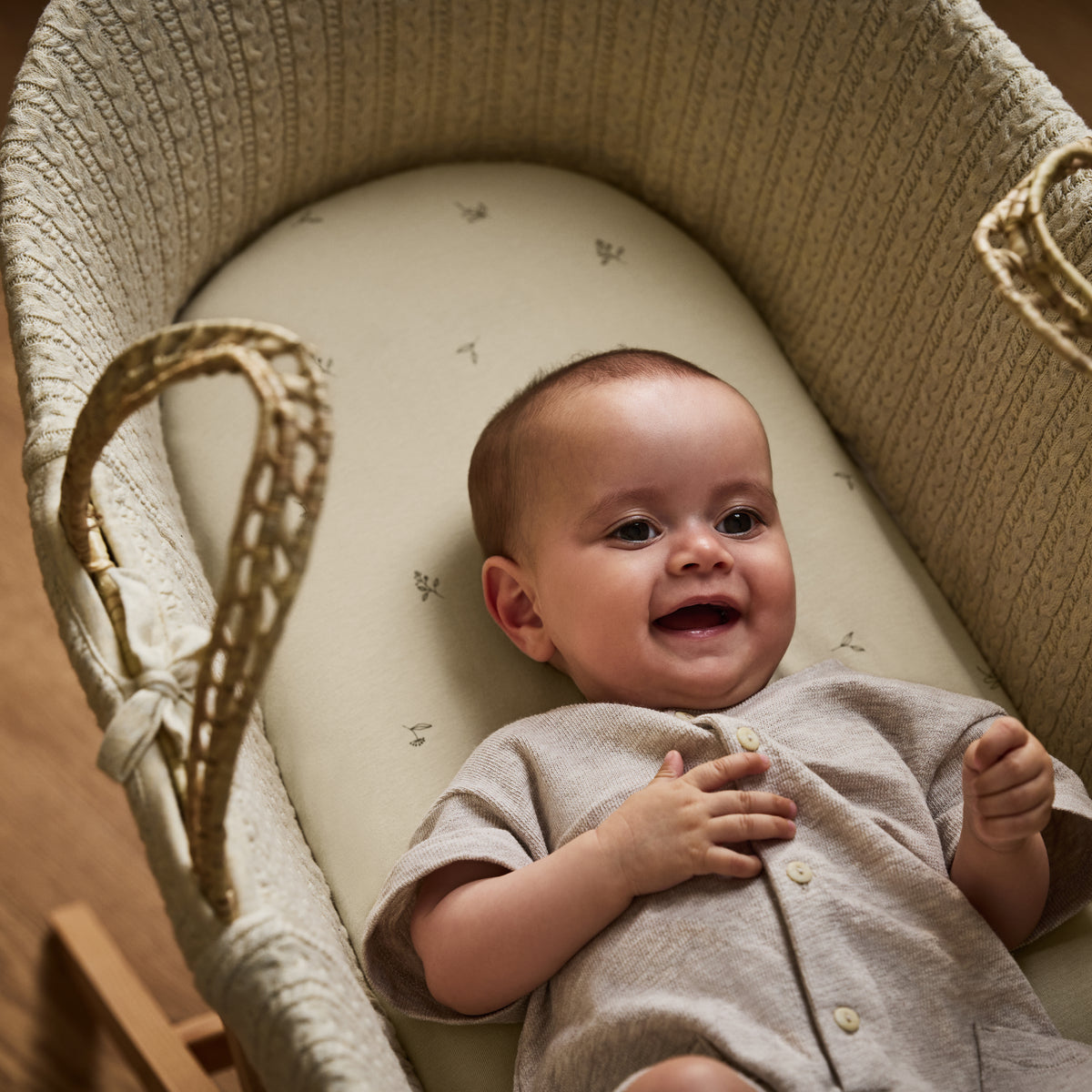 Little green sheep organic cotton moses basket/pram fitted sheets in floral and cream colour.