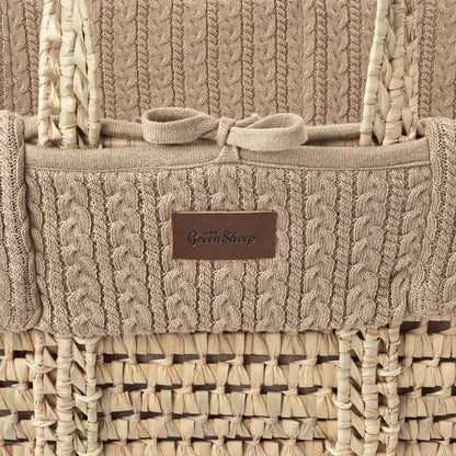 Truffle moses basket with a close up view of stitching