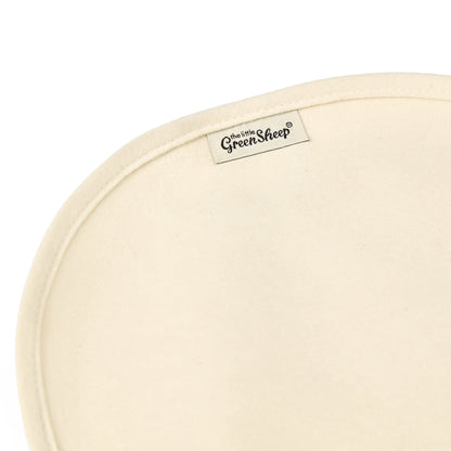 Little green sheep organic mattress protector for moses basket of pram, in a natural beige colour.