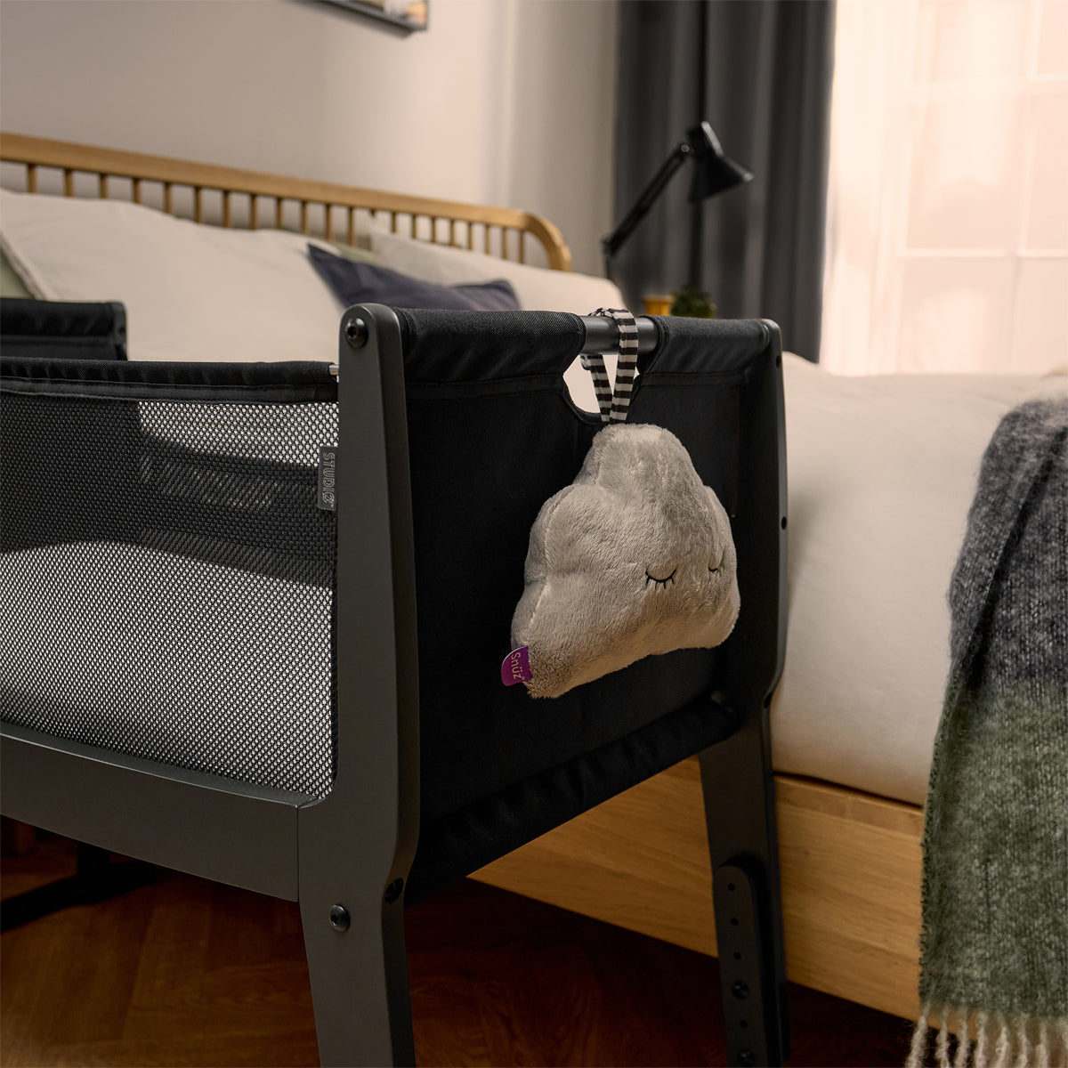 SnuzPod Studio bedside crib in Brooklyn Dark Grey colour.