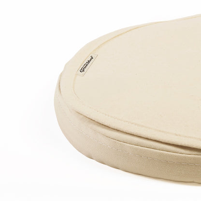 Little green sheep organic mattress protector for moses basket of pram, in a natural beige colour.