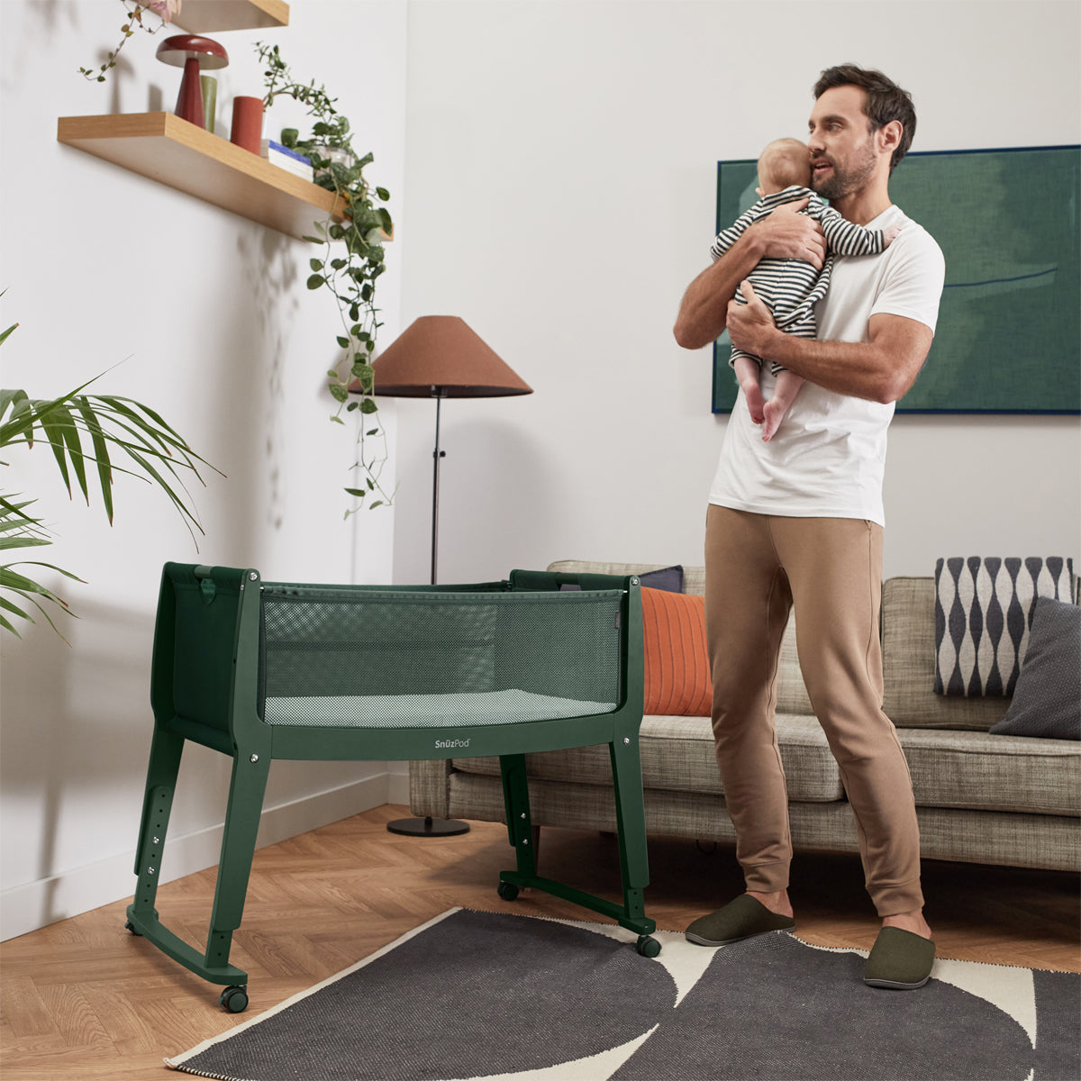 SnuzPod Studio bedside crib in Berlin Green colour.