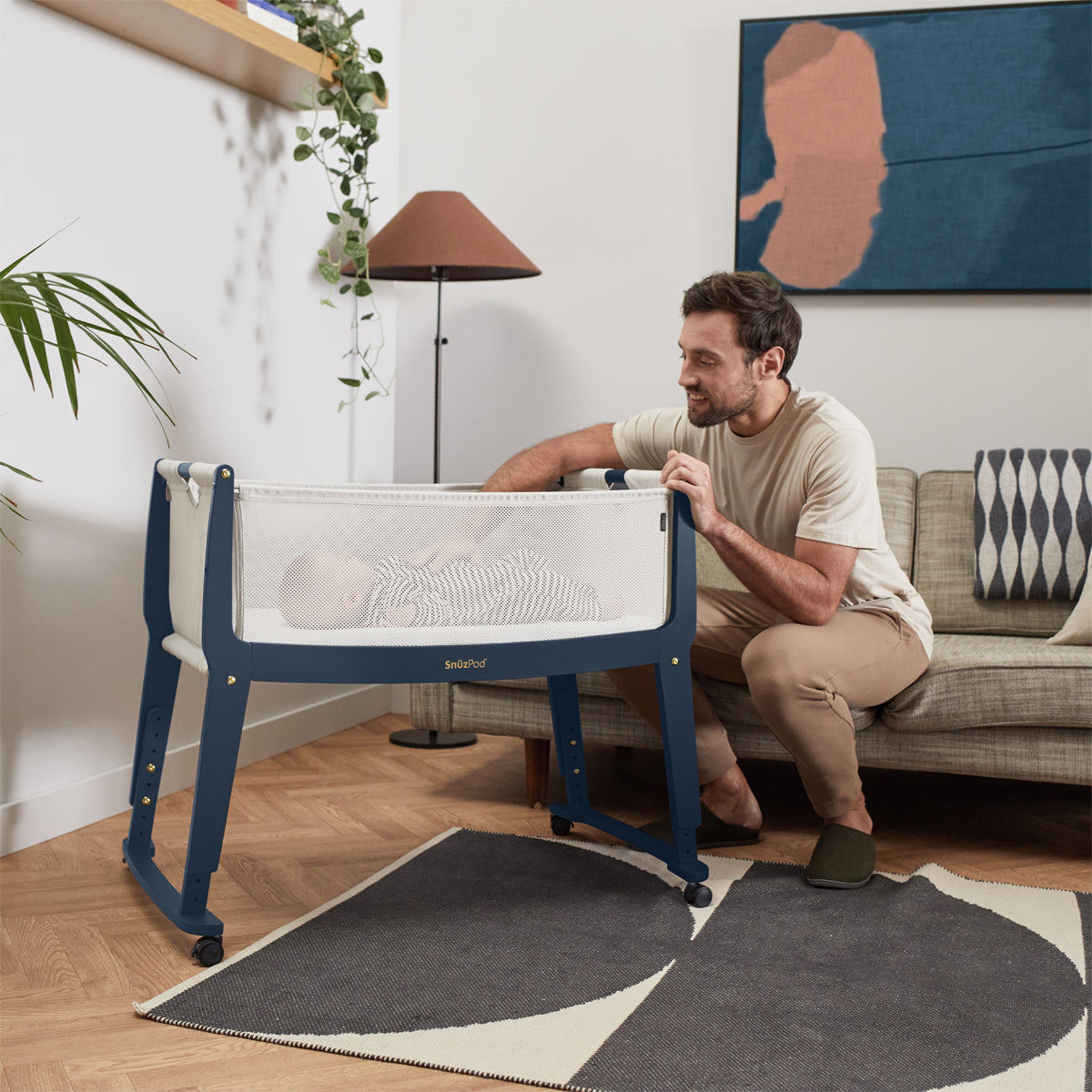 SnuzPod Studio bedside crib in London Navy colour.