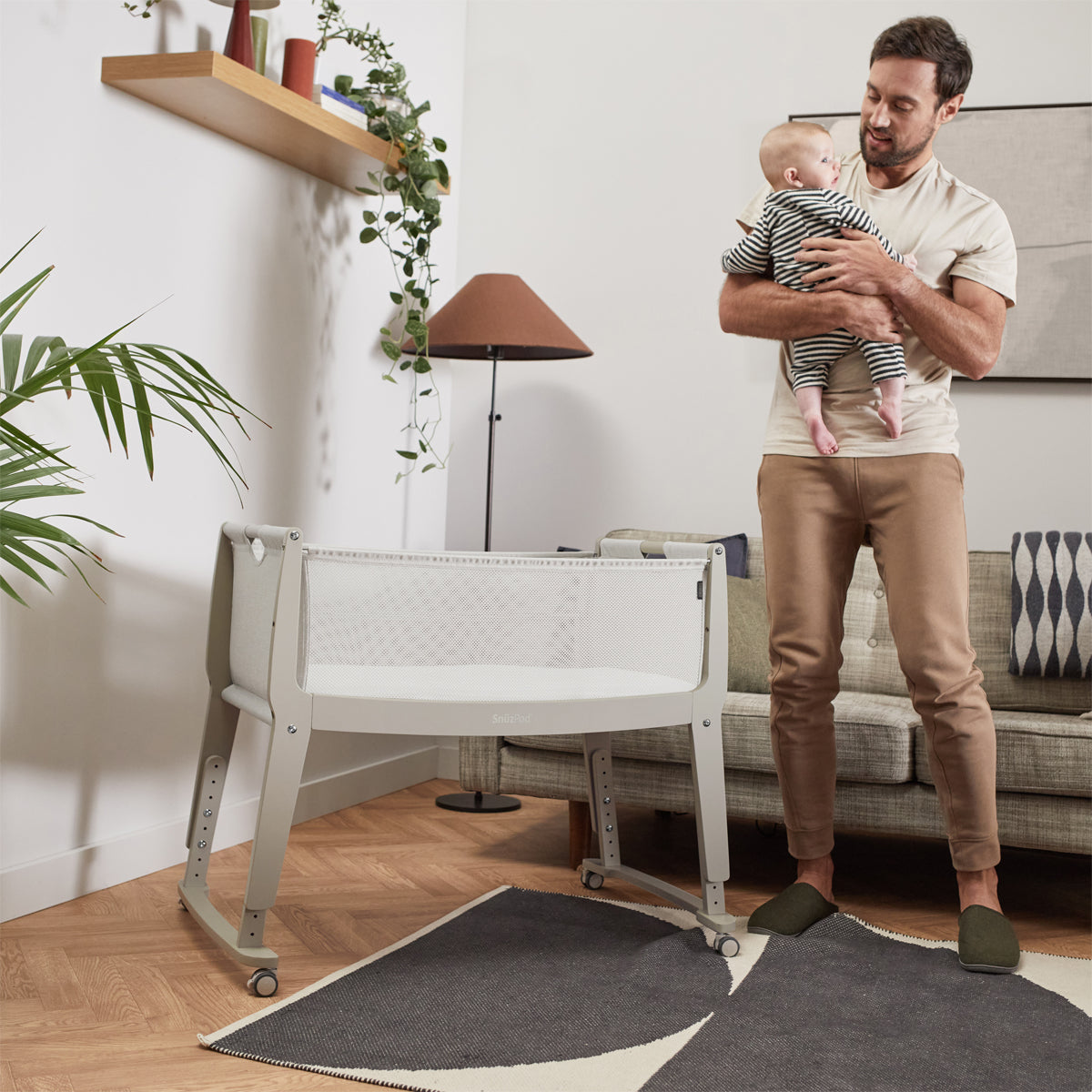 SnuzPod Studio bedside crib in Oslo Light Grey colour.
