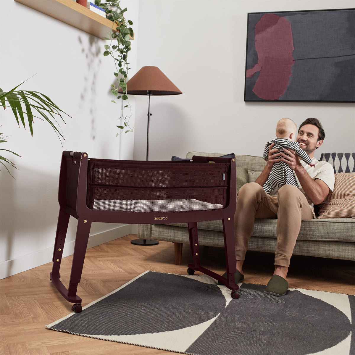 SnuzPod Studio bedside crib in Rome Burgundy colour.