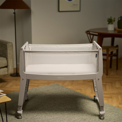 SnuzPod Studio bedside crib in Oslo Light Grey colour.