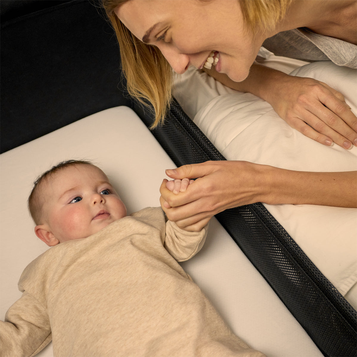 SnuzPod Studio bedside crib in Brooklyn Dark Grey colour.