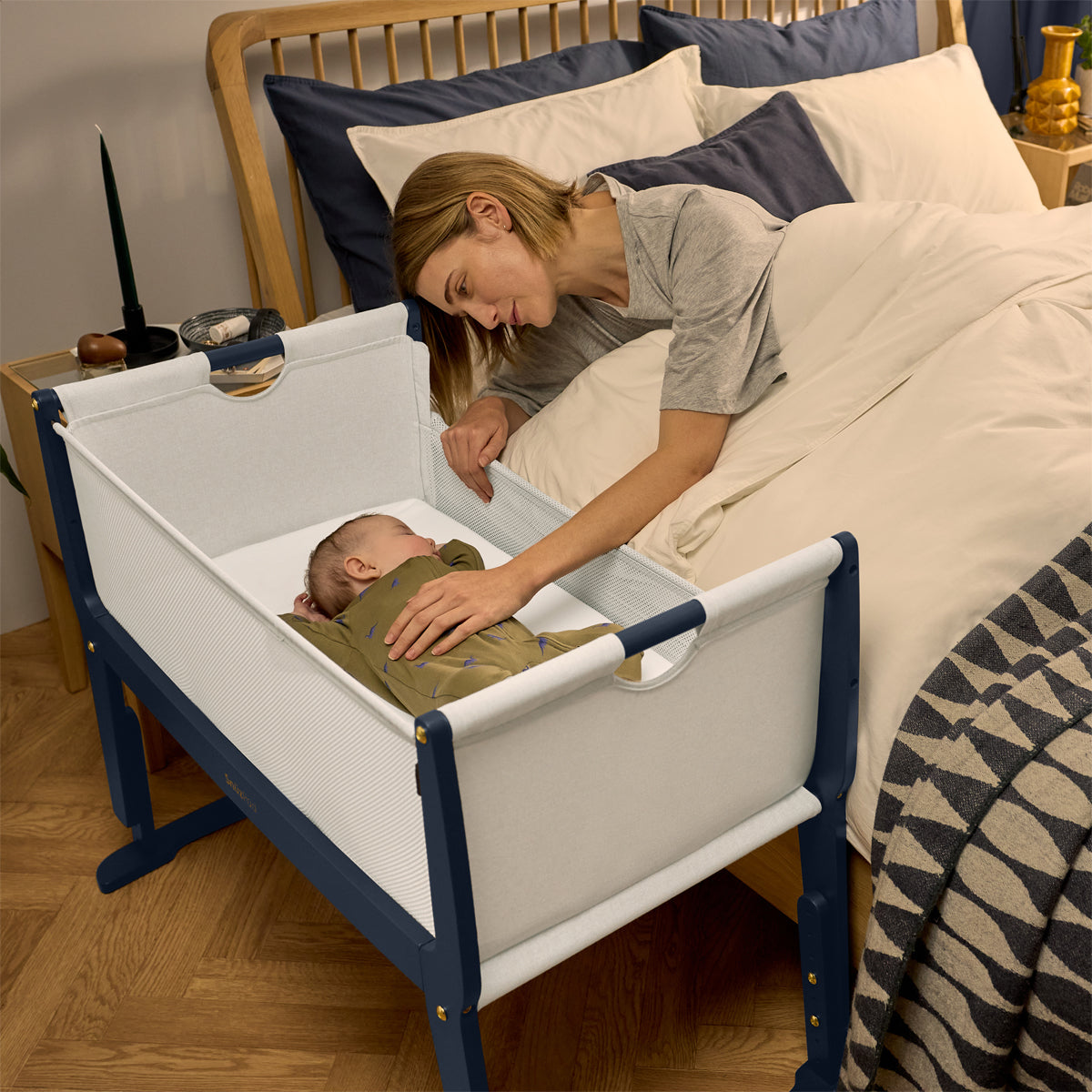 SnuzPod Studio bedside crib in London Navy colour.