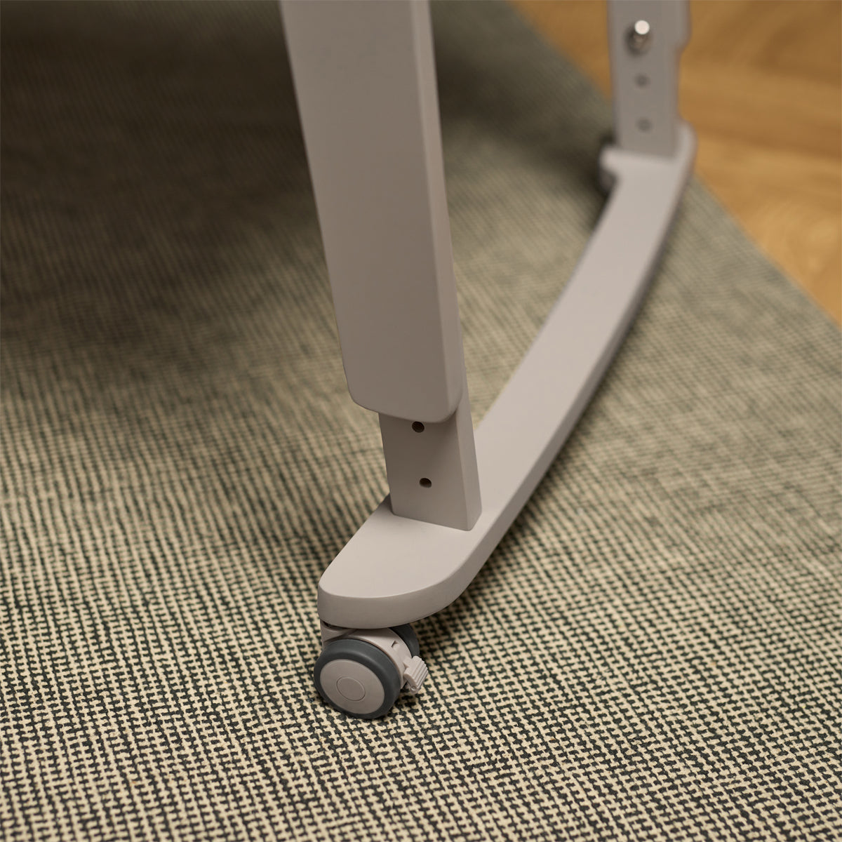 SnuzPod Studio bedside crib in Oslo Light Grey colour.