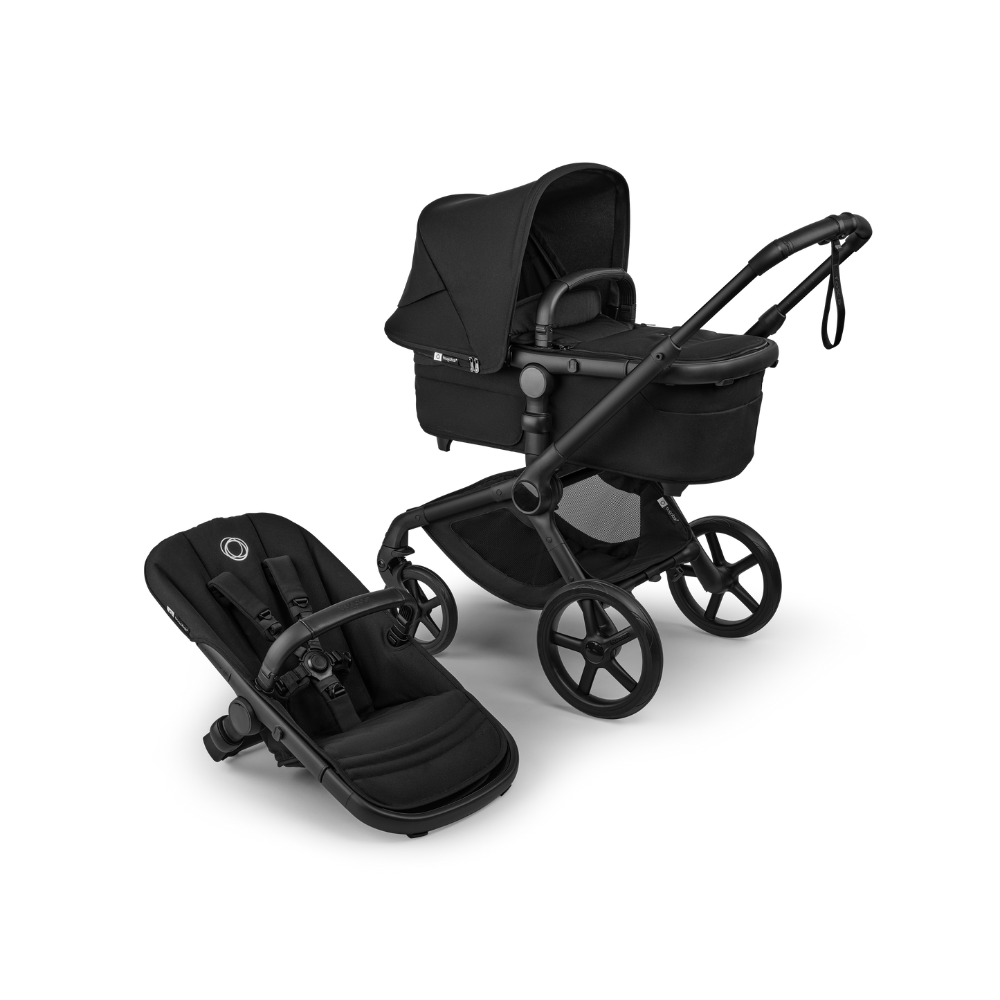 The Heritage Black Bugaboo Fox5 pushchair, equipped with a seat and carrycot fabric, offers a compact fold for all-terrain use.