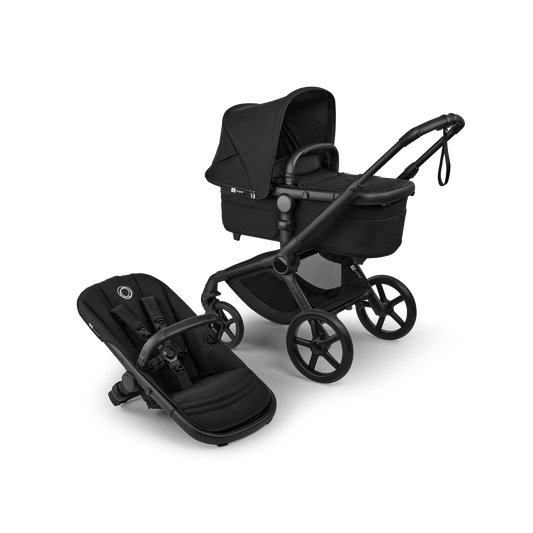 The Heritage Black Bugaboo Fox5 pushchair, equipped with a seat and carrycot fabric, offers a compact fold for all-terrain use.