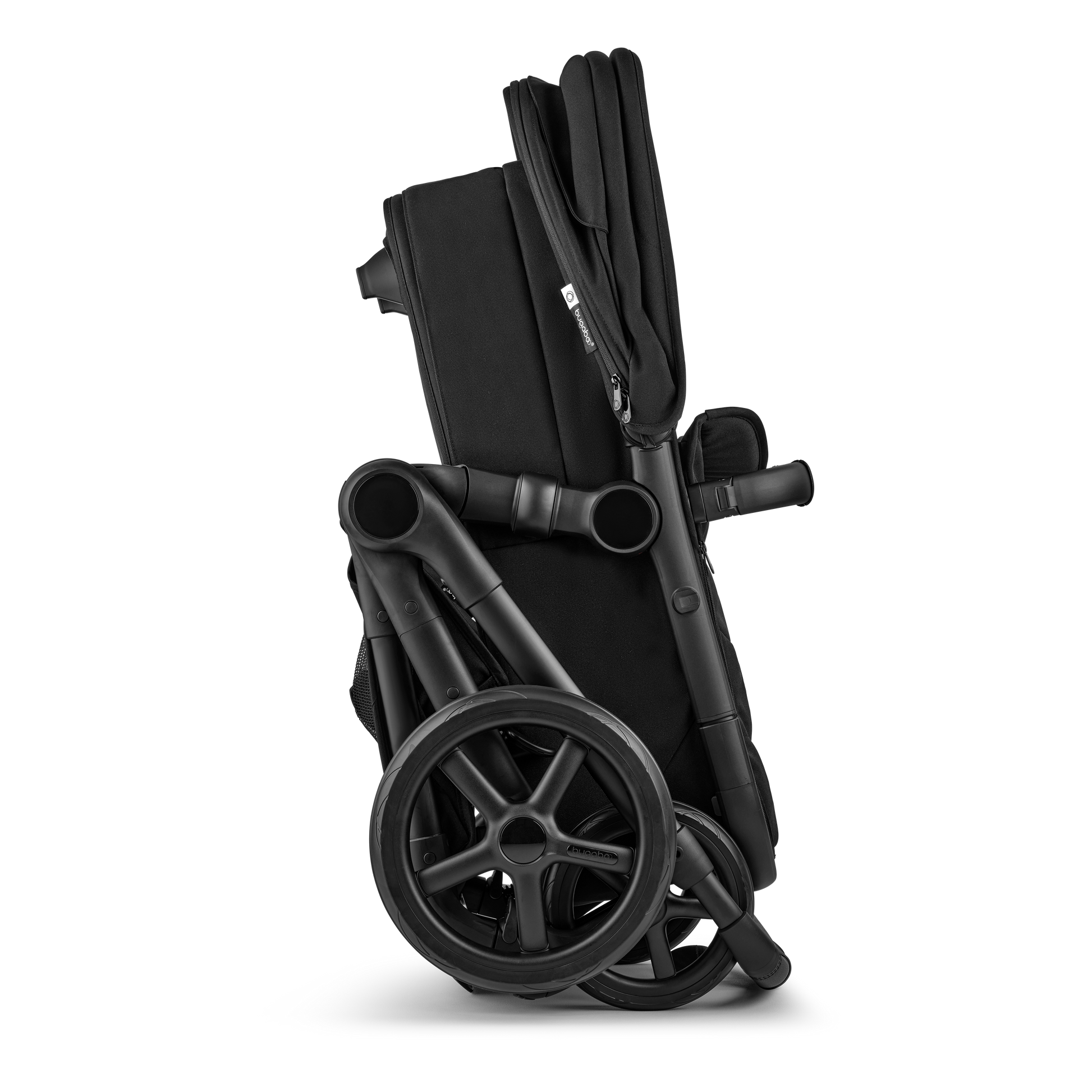 The Heritage Black Bugaboo Fox5 pushchair, equipped with a seat and carrycot fabric, offers a compact fold for all-terrain use.