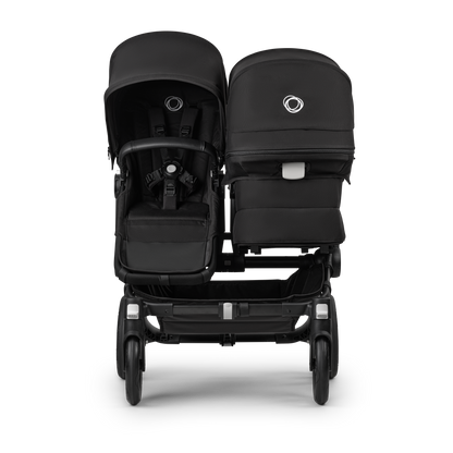 Midnight Black Bugaboo Donkey 5 stroller with 2 x seat and1 x carrycot fabrics, designed for easy folding and adaptable for mono, duo or twin configurations.