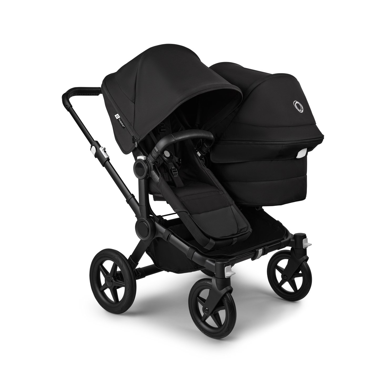 Midnight Black Bugaboo Donkey 5 stroller with 2 x seat and1 x carrycot fabrics, designed for easy folding and adaptable for mono, duo or twin configurations.