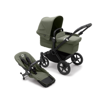 Forest Green Bugaboo Donkey 5 stroller with seat and carrycot fabrics, designed for easy folding and adaptable for duo or twin configurations.