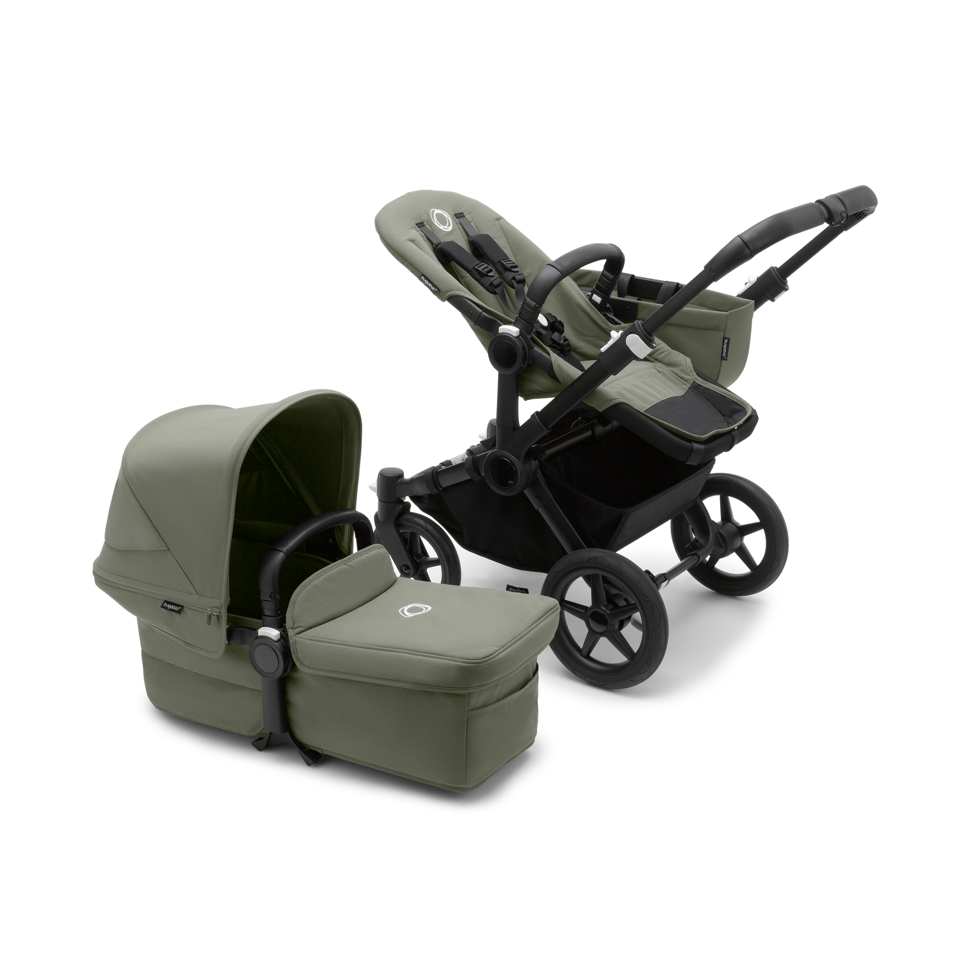 Forest Green Bugaboo Donkey 5 stroller with seat and carrycot fabrics, designed for easy folding and adaptable for duo or twin configurations.