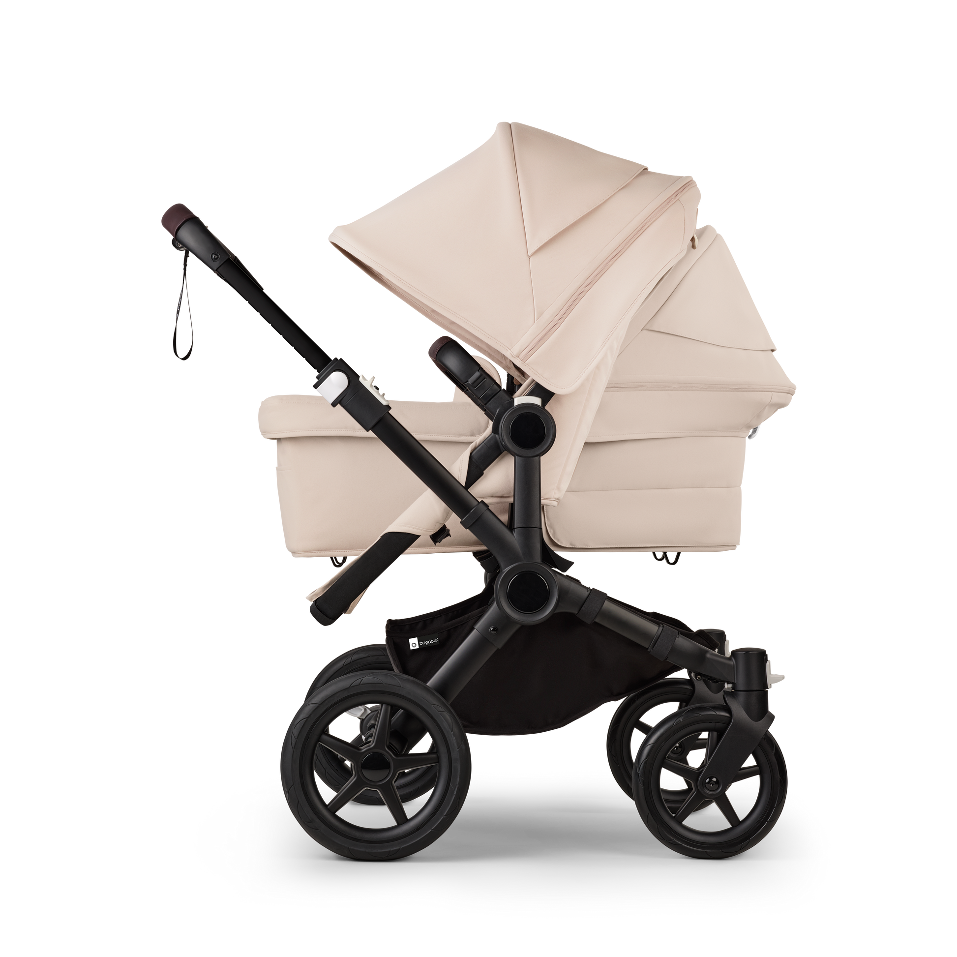 Desert Taupe Bugaboo Donkey 5 stroller with 2 x seat and1 x carrycot fabrics, designed for easy folding and adaptable for mono, duo or twin configurations.