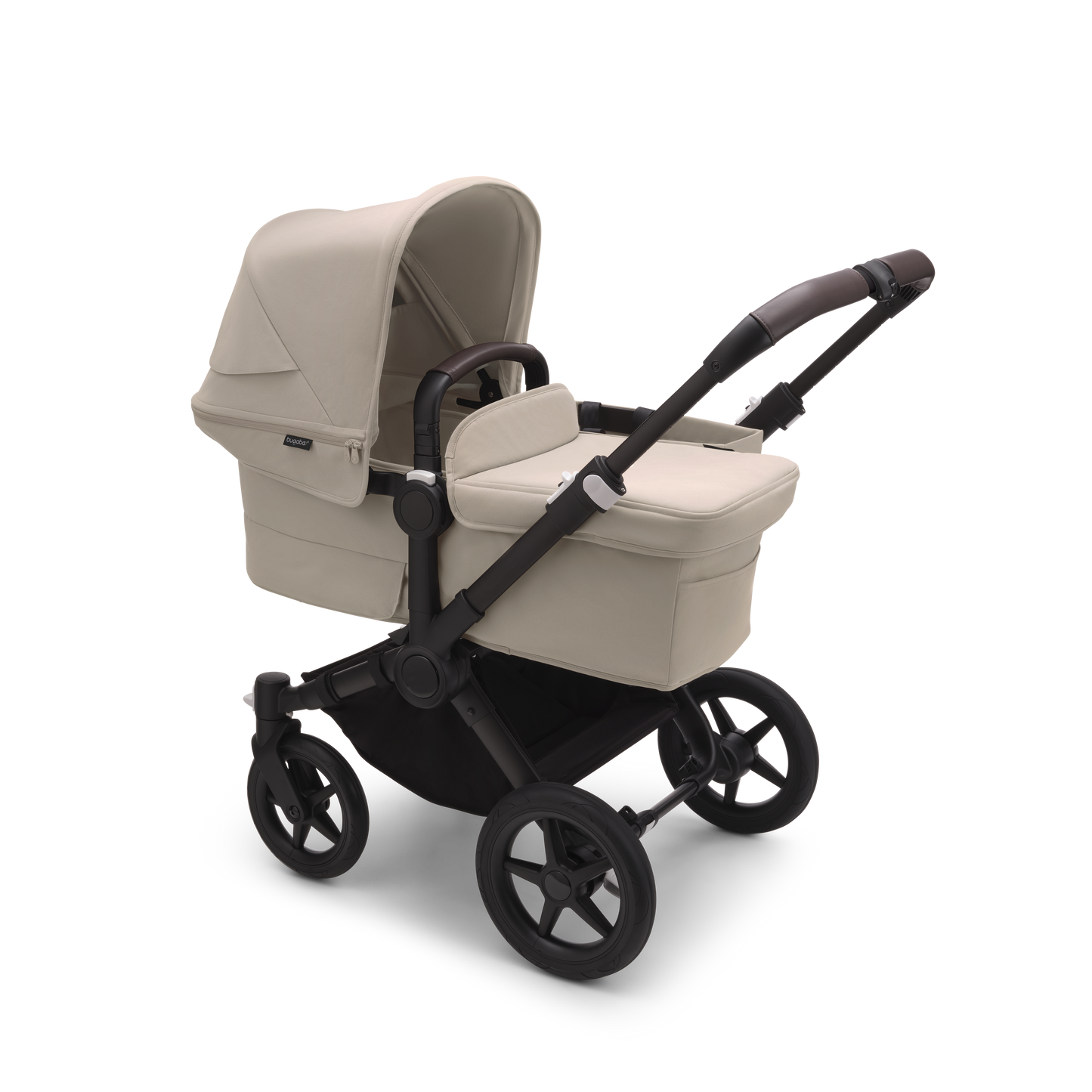 Desert Taupe Bugaboo Donkey 5 stroller with seat and carrycot fabrics, designed for easy folding and adaptable for duo or twin configurations.