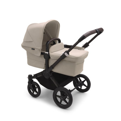 Desert Taupe Bugaboo Donkey 5 stroller with seat and carrycot fabrics, designed for easy folding and adaptable for duo or twin configurations.