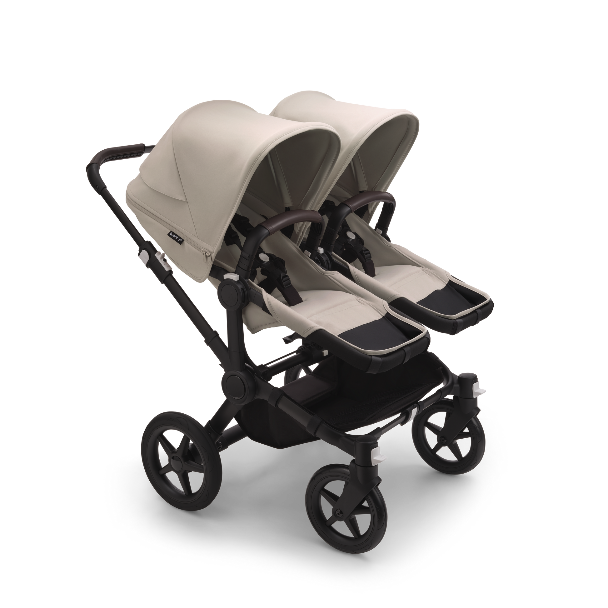 Desert Taupe Bugaboo Donkey 5 stroller with 2 x seat and 2 x carrycot fabrics, designed for easy folding and adaptable for mono, duo or twin configurations.