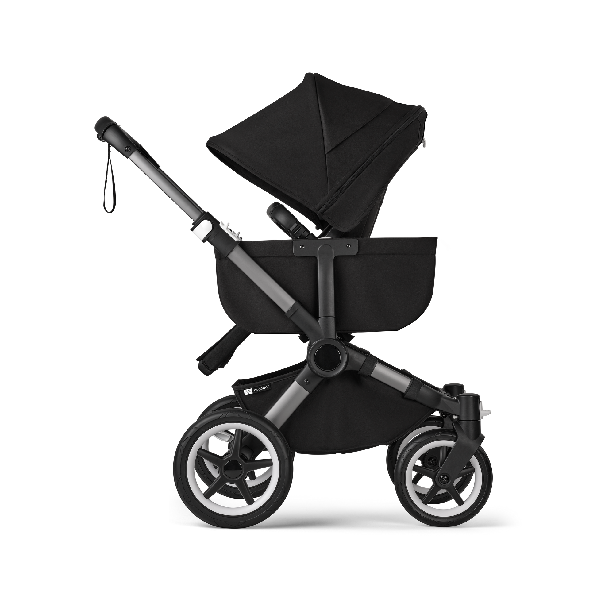 Midnight Black Bugaboo Donkey 5 stroller with seat and carrycot fabrics, designed for easy folding and adaptable for duo or twin configurations.