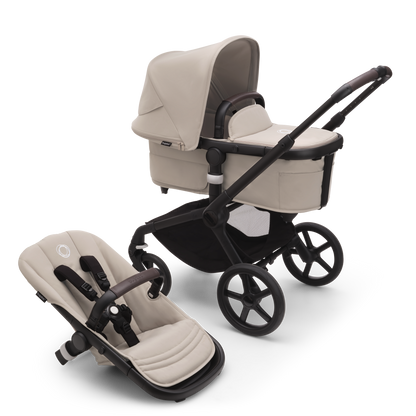 Bugaboo Fox5 stroller in Taupe Complete, equipped with a carrycot, compact fold, and suitable for all terrains.