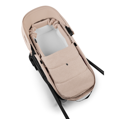 Bugaboo baby nest in desert taupe colourway to fit inside various pushchairs.
