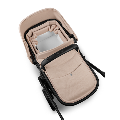 Bugaboo baby nest in desert taupe colourway to fit inside various pushchairs.