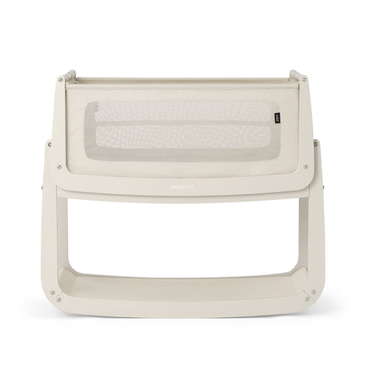 A Cashmere Snuzpod5 bedside crib designed for infants, showcasing a modern and safe sleeping environment.