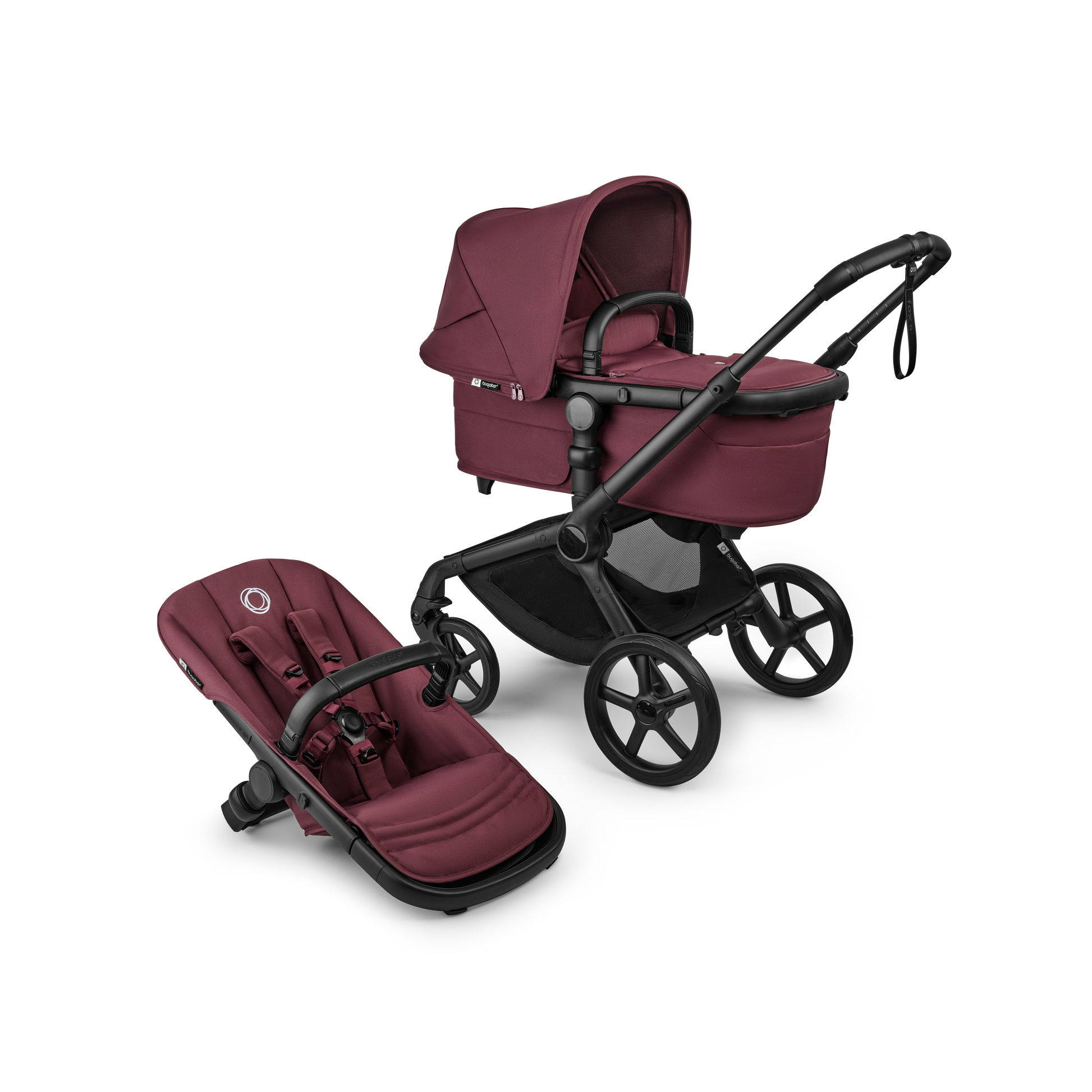 The dark cherry Bugaboo Fox5 pushchair, equipped with a seat and carrycot fabric, offers a compact fold for all-terrain use.