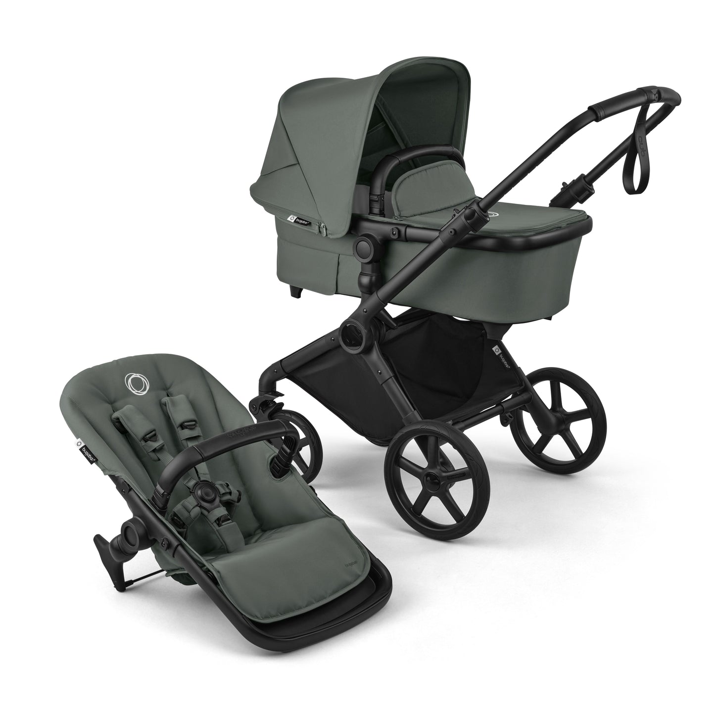 Bugaboo Cub stroller and carrycot in forest green with black chassis.