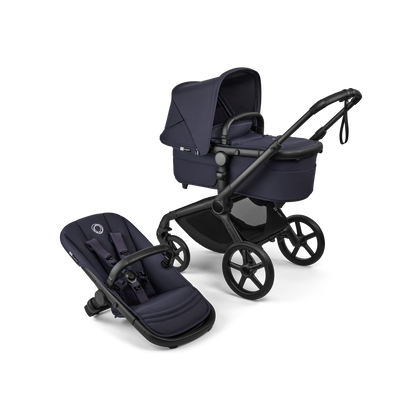 The deep indigo Bugaboo Fox5 pushchair, equipped with a seat and carrycot fabric, offers a compact fold for all-terrain use.