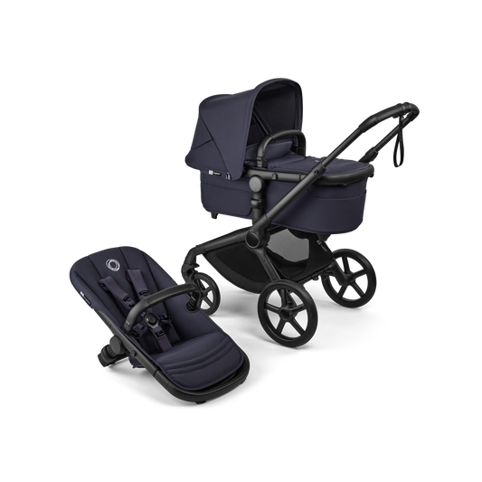 The deep indigo Bugaboo Fox5 pushchair, equipped with a seat and carrycot fabric, offers a compact fold for all-terrain use.