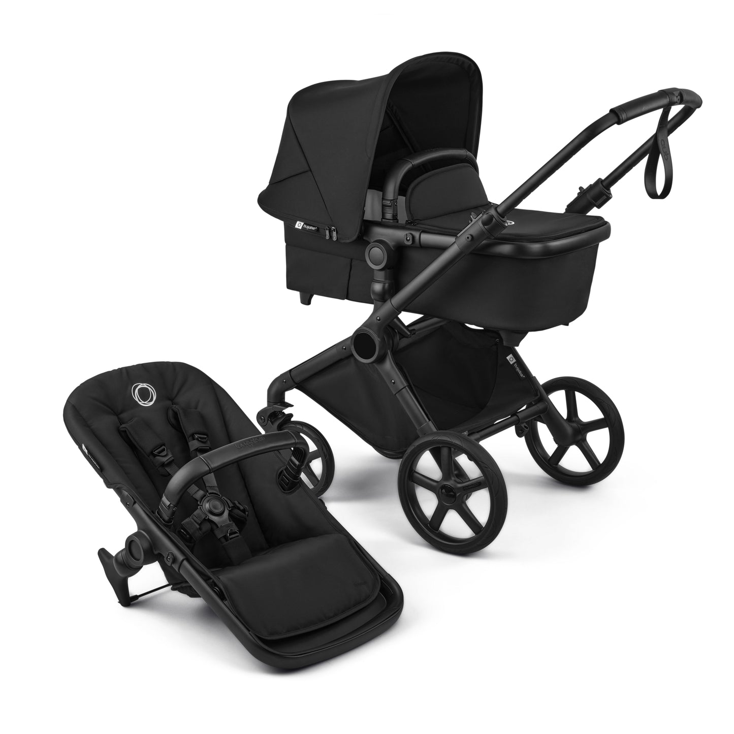 Bugaboo Cub stroller and carrycot in heritage black with black chassis.