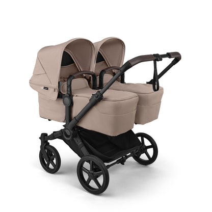 Bugaboo Donkey Twin travel system in desert taupe beige colour with matching accessories and cybex cloud s car seats and isofix bases.