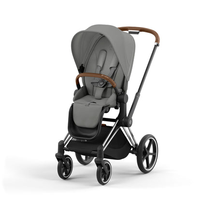 Cybex Priam chrome chassis with brown handle and mirage grey seat pack.