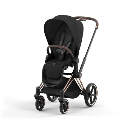 Cybex Priam rose gold chassis with dark brown handle and sepia black seat pack.