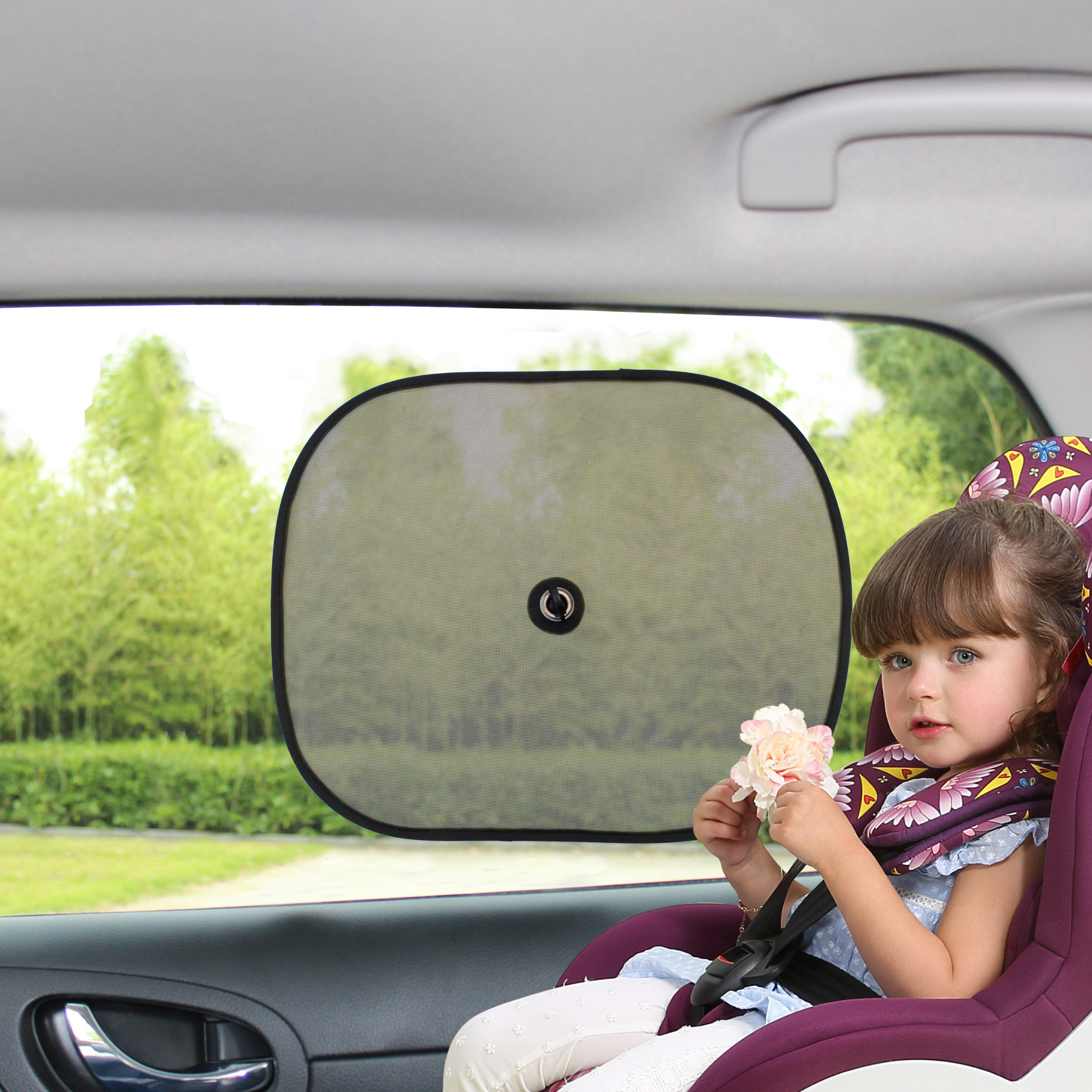 Two side window shields for sun protection, designed for easy installation.