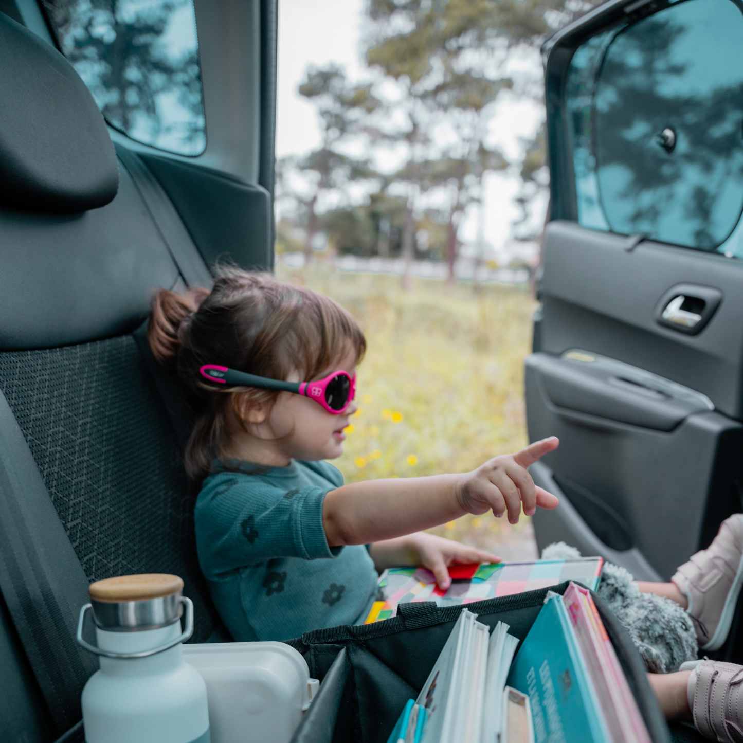 Two side window shields for sun protection, designed for easy installation.