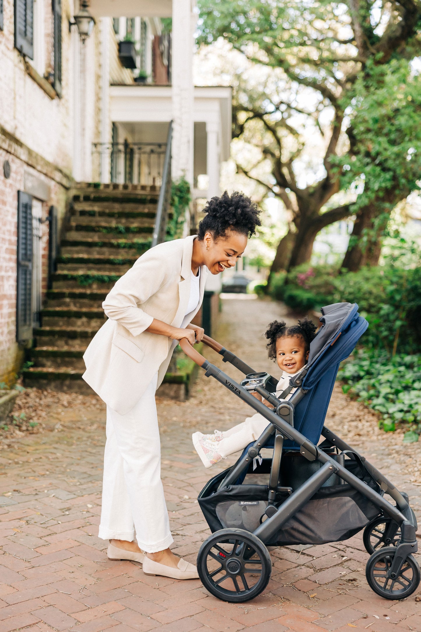 UPPAbaby black snack tray attached to a stroller.