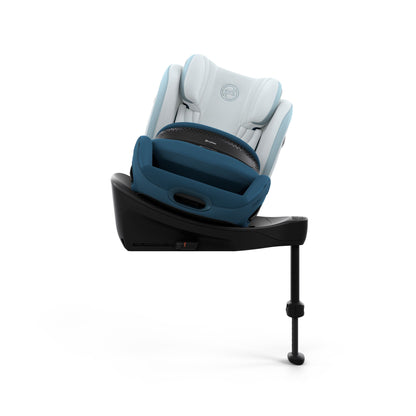 Cybex anoris Si car seat with airbag in opal blue style colour, with isofix base attatched.