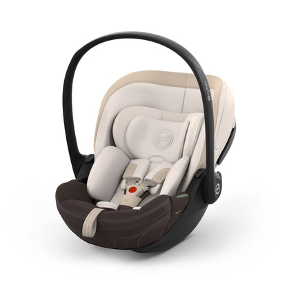 Cybex cloud s car seat in amber brown colour, with recline function.